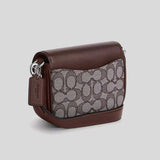 COACH Amelia Saddle Bag In Signature Jacquard Maple CU982