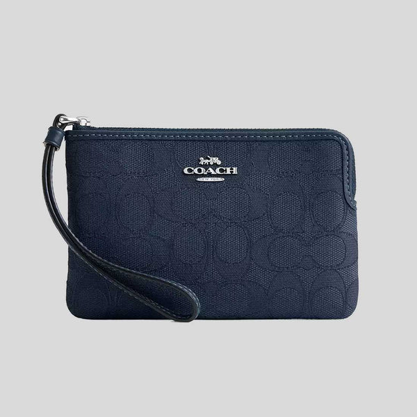 COACH Corner Zip Wristlet In Signature Jacquard Dark Denim CW862