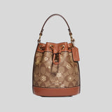 COACH Dempsey Drawstring Bucket Bag 15 In Signature Canvas With Snowflake Print Khaki Multi CE587 lussocitta lusso citta