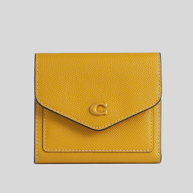 Small yellow coach purse on sale