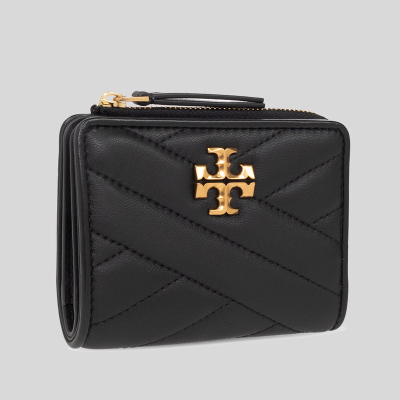 Black Tory Burch wallet, with wear on the zipper and... - Depop