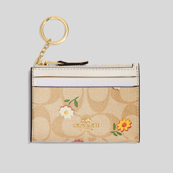 Coach Mini Skinny Id Case In Signature Canvas With Nostalgic Ditsy Print Light Khaki Multi CH481