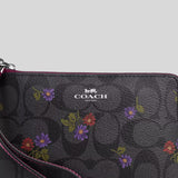 Coach Corner Zip Wristlet In Signature Canvas With Country Floral Print CM867