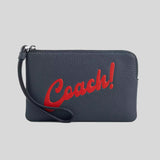 COACH Corner Zip Wristlet With Coach Graphic Denim CU253