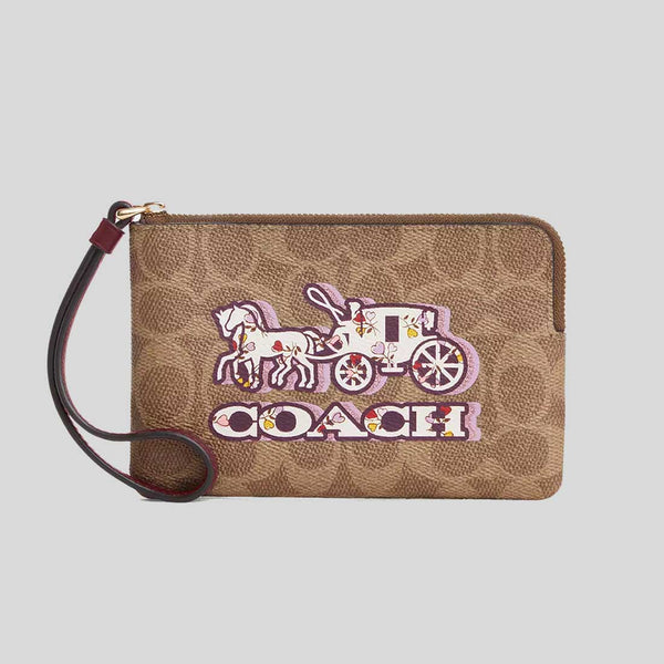 COACH Corner Zip Wristlet In Signature Canvas With Horse And Carriage Print CX589