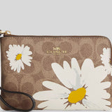 COACH Corner Zip Wristlet In Signature Canvas With Floral Print Tan Multi CZ604